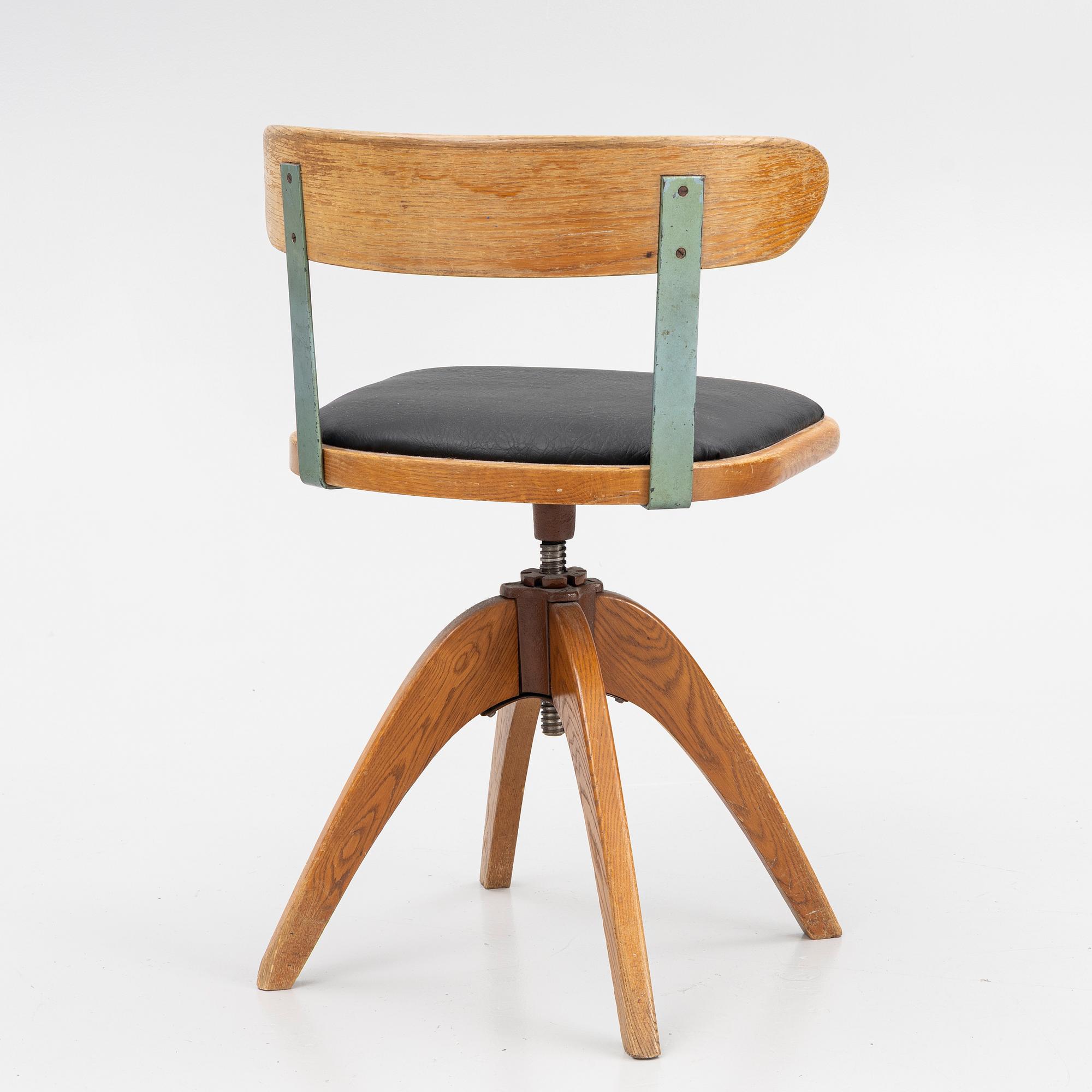 A 1920's swivel desk chair.