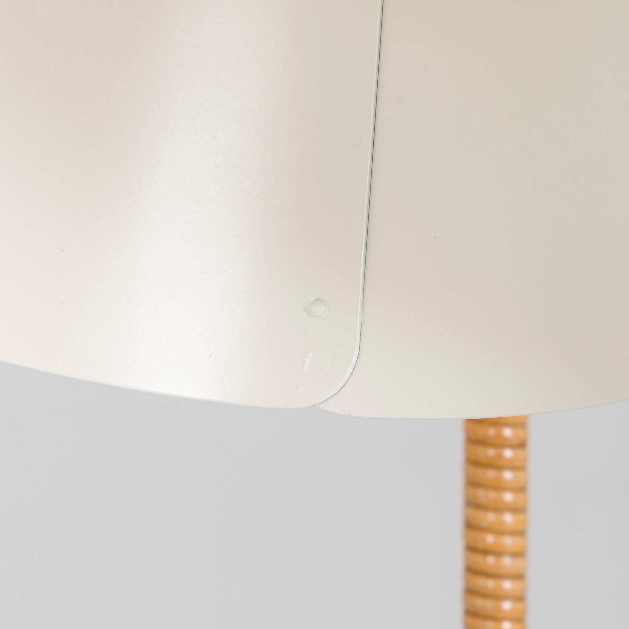 Paavo Tynell, a mid-20th century K10-10 floor lamp for Taito.
