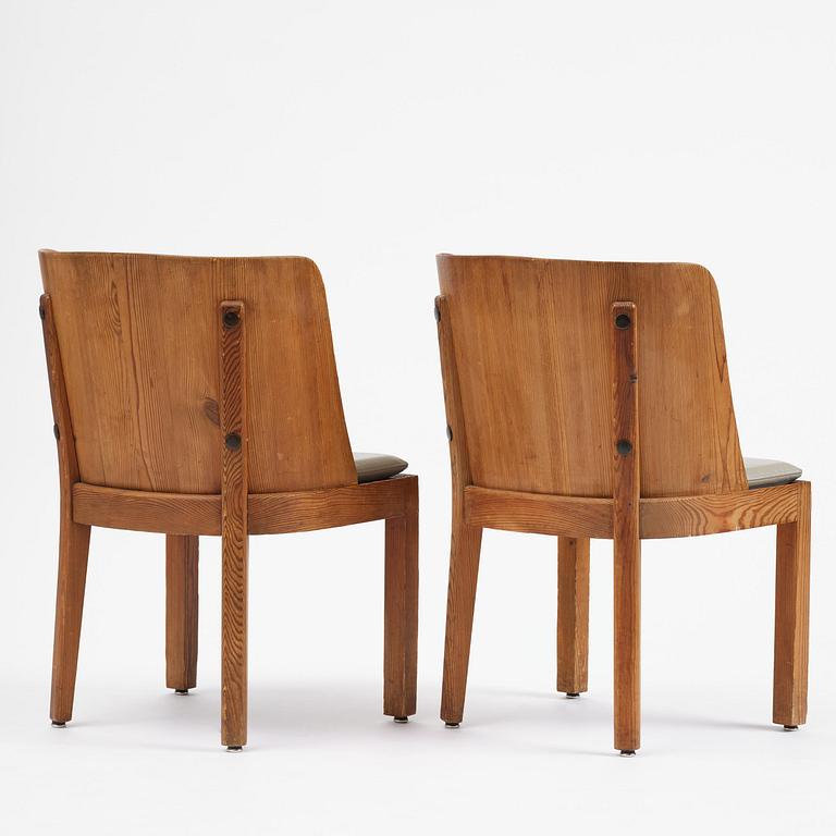 Axel Einar Hjorth, a pair of stained pine "Lovö" armchairs, Nordiska Kompaniet, Sweden, 1930s.