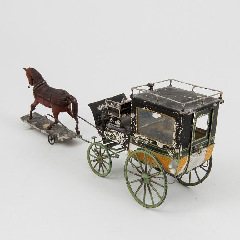 A tin horse and wagon possibly by Eichner, Germany, second half of the 19th century.