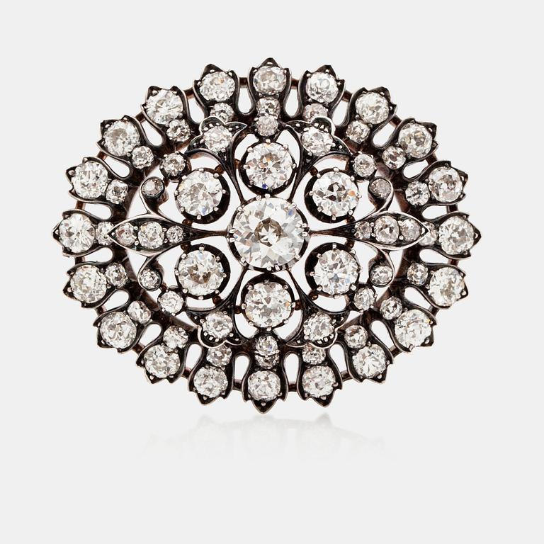 An old-cut diamond brooch, total carat weight 9.40 cts. Center diamond circa 1.10 cts.