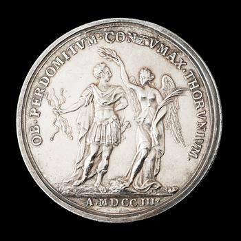 MEDALJ. Karl XII i anledning av erövringen av Thorn 1703. Utförd av A. Karlsteen 1704. Silver 5,2 cm 62,3 g.