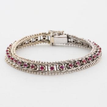 Bracelet with faceted rubies.