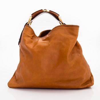 Gucci, a 'Horsebit Hobo' bag.