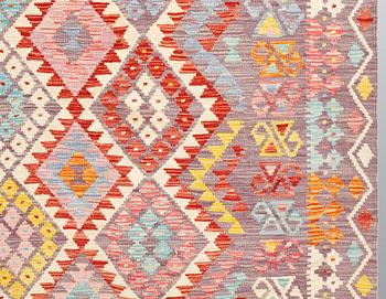 A kilim carpet ca 338 x 256 cm.