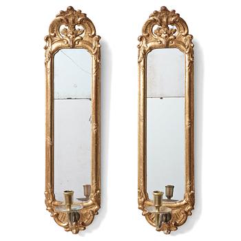 108. A pair of Swedish Rococo 18th century one-light girandole mirrors.