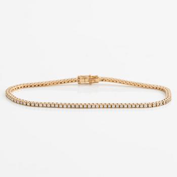 Tennisarmband 18K guld med runda briljantslipade diamanter.