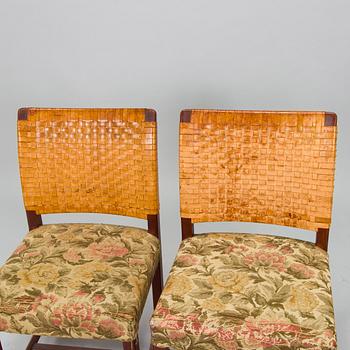 Carl Gustaf Hiort af Ornäs, a mid-20th-century 'Näyttely Senior' dining table and 12 chairs for HMN Huonekalu Nupponen.