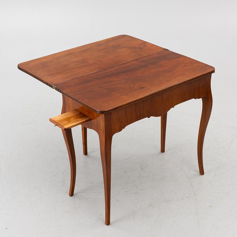 A Rococo game table, 18th century.