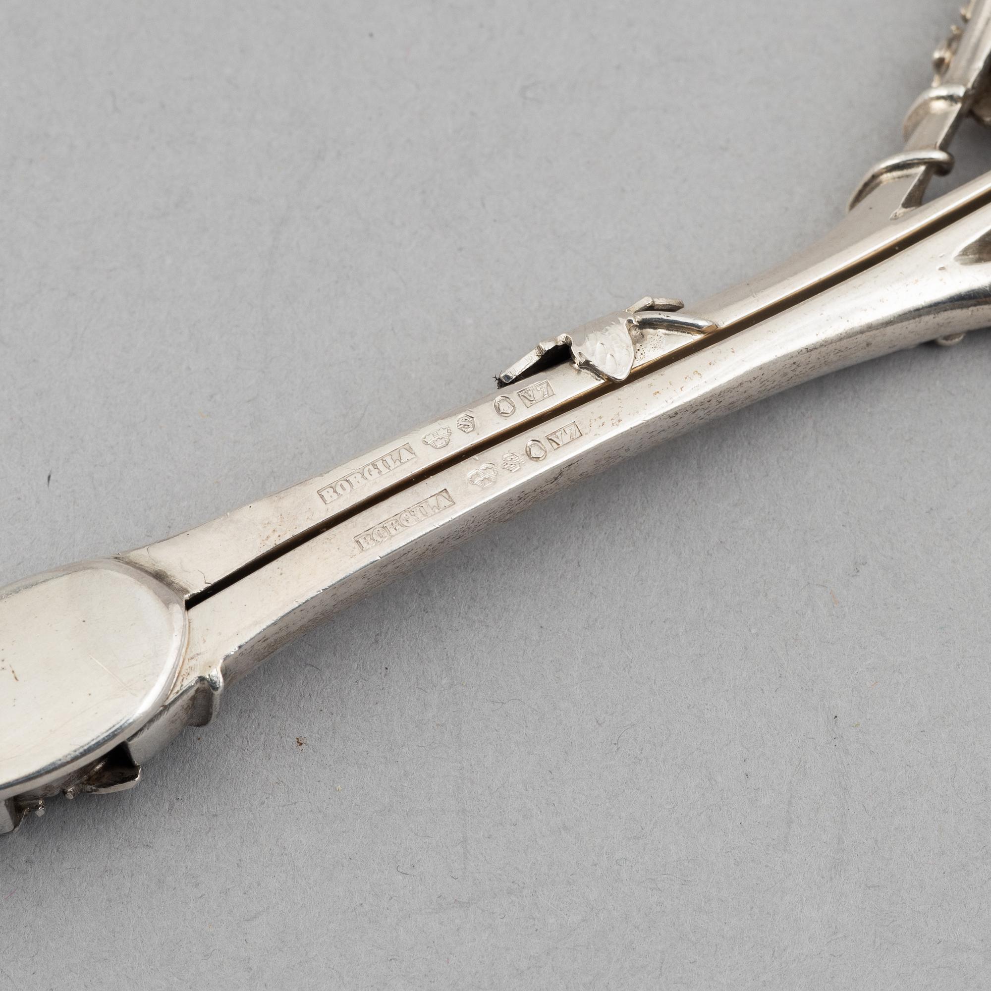 Three silver tongs, Sweden and Denmark, 1834-1923.