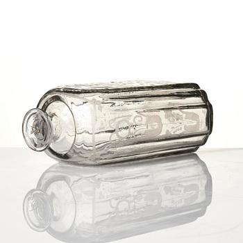 Flaska, glas. Troligen Skånska glasbruket, 1700-tal.