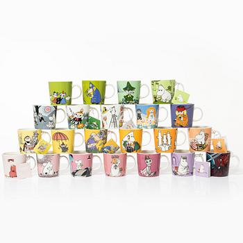 A set of 31 Moomin mugs, Arabia, Finland.