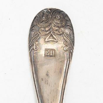 Two pierced silver bowls and two sugar spoons, including Sweden and Endland, 20th century.