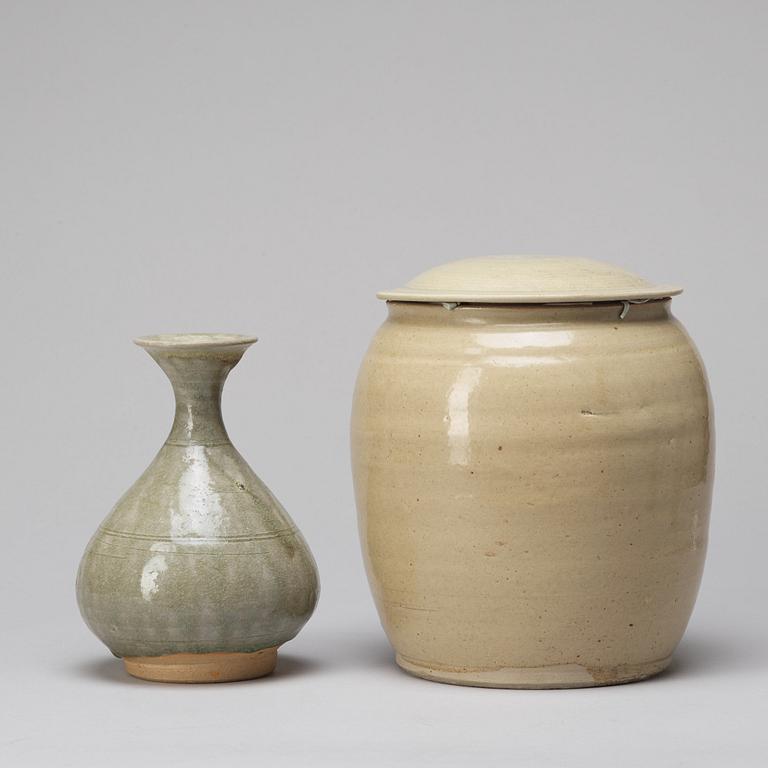 A celadon glazed jar with cover and a vase, South East Asia, 16/17th Century.
