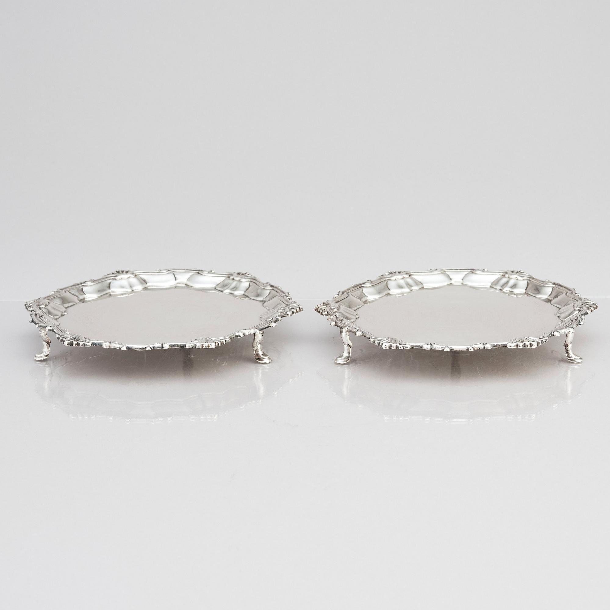 A pair of English silver salvers/plates, marks of Thomas Cooke II and Richard Gurney, London 1753.