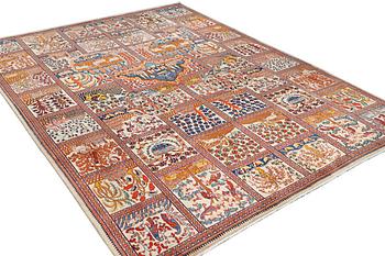 A Kashmar carpet, c. 391 x 291 cm.
