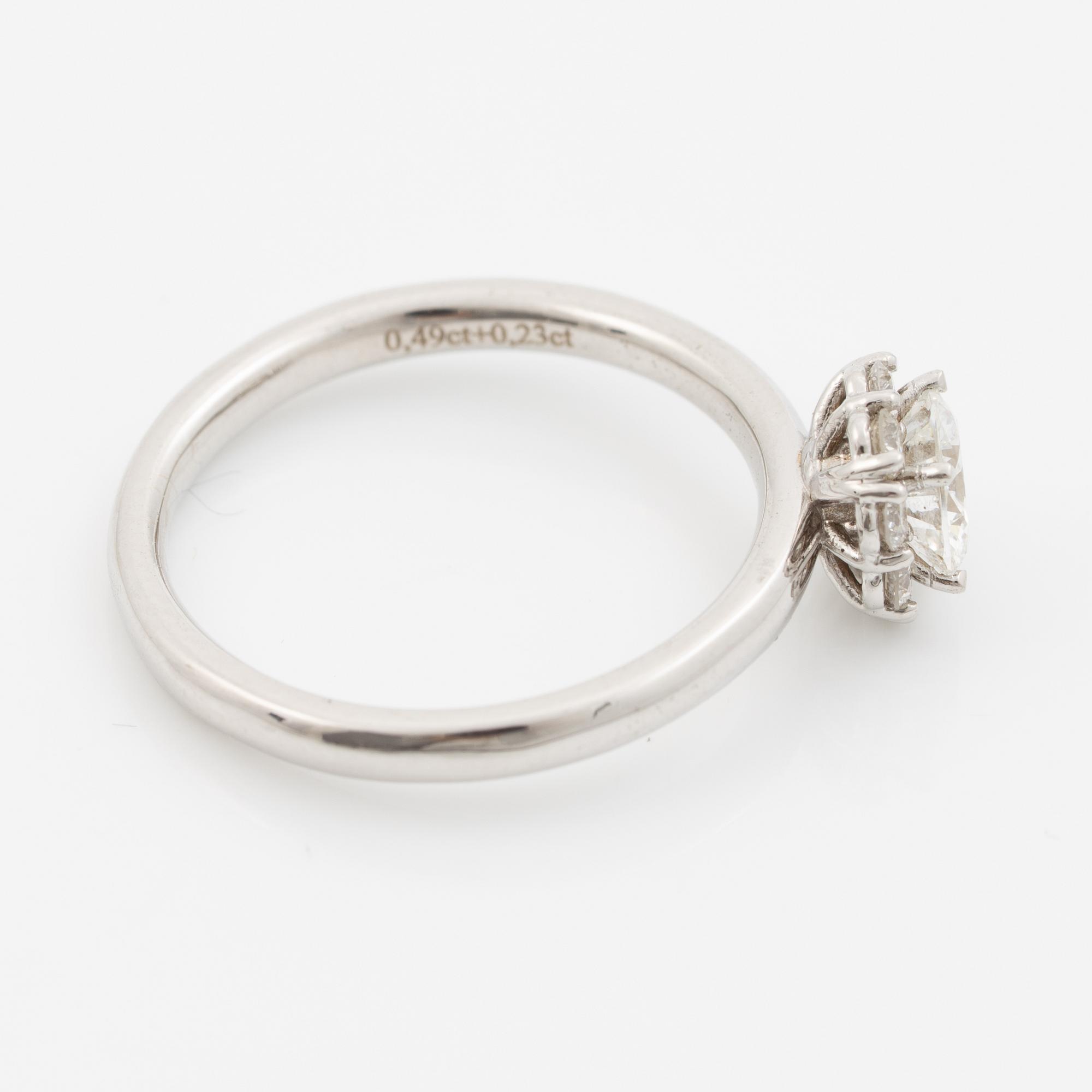 Ring 18K white gold set with a brilliant-cut diamond, accompanied by an IGI report.