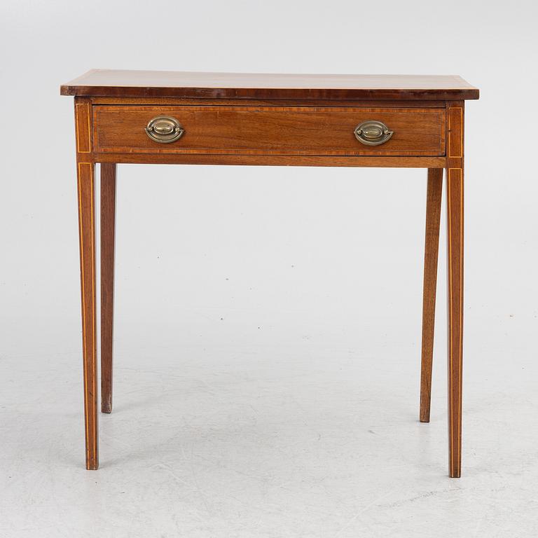 A table, England, circa 1900.
