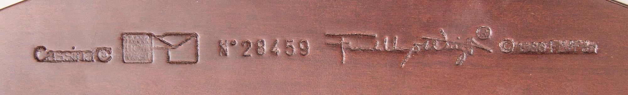 A pair of "606 Barrel Taliesin" armchairs by Frank Lloyd Wright for Cassina 1989, signed and numbered 28459, 28581.