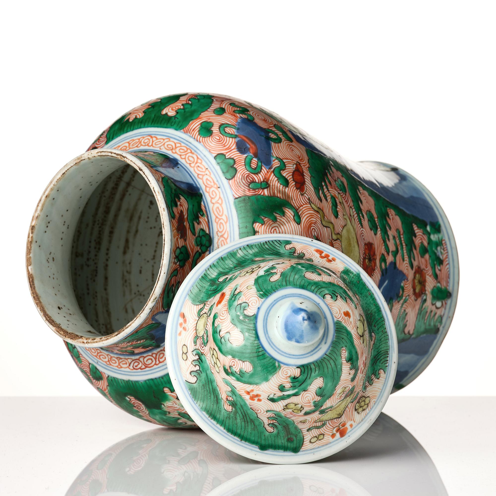 A pair of Transitional Wucai jars, 17th Century.