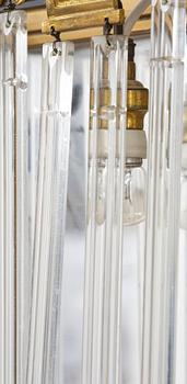 A pair of mirror sconces, 1910's/20's.