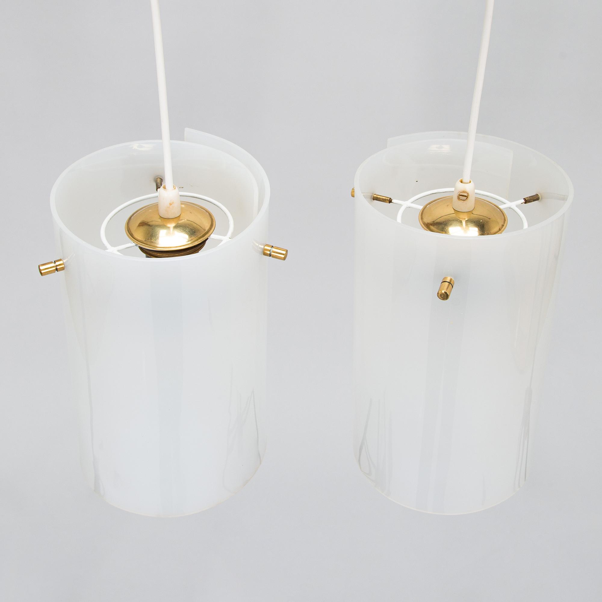 A pair of mid-20th century pendant lights for SO, Pohjoismainen Sähkö Oy, Finland.