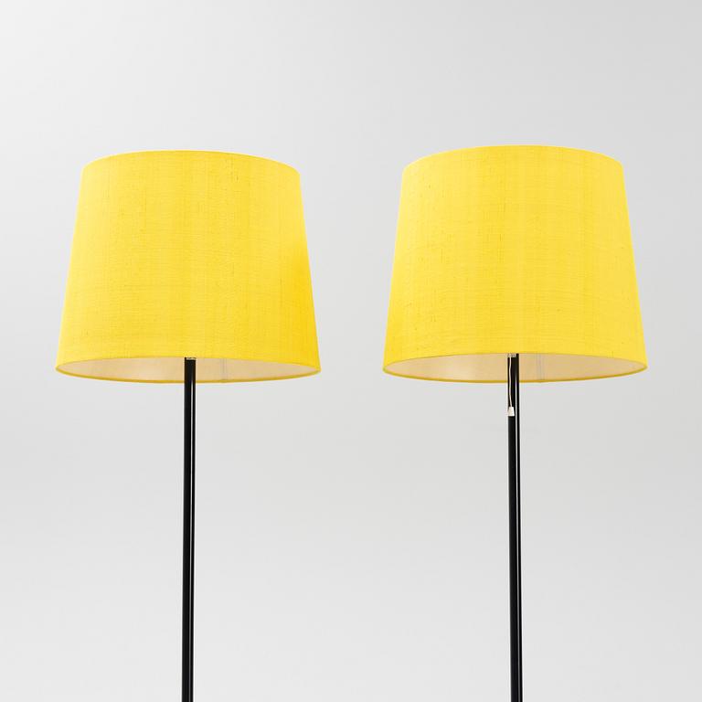 A pair of black metal floorlights, Luxus, Vittsjö.