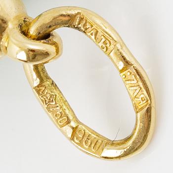 W.A. Bolin, pendant in the form of an egg, 18K gold and silver and enamel.