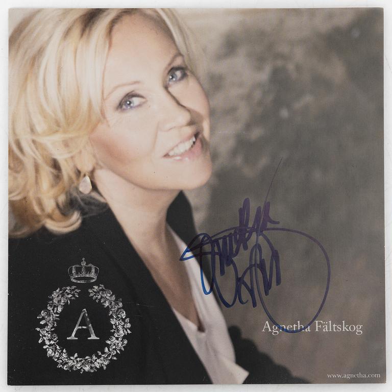 ABBA, "ORO", guldskiva, samt av Agnetha Fältskog signerat promotionmaterial.