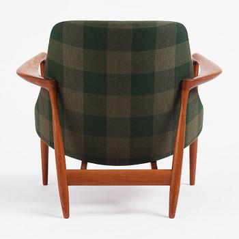 Ib Kofod-Larsen, an "Elisabeth" teak armchair, model "U 65", master carpenter Christensen & Larsen, Denmark 1950s-60s.