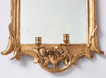 A pair of Danish rococo girandole mirrors.