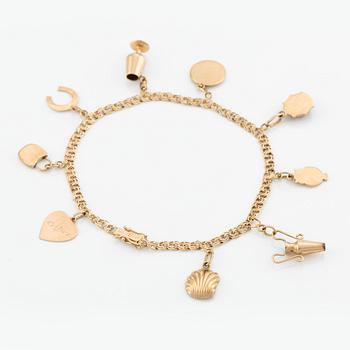 Armband, 18K guld, med berlocker.