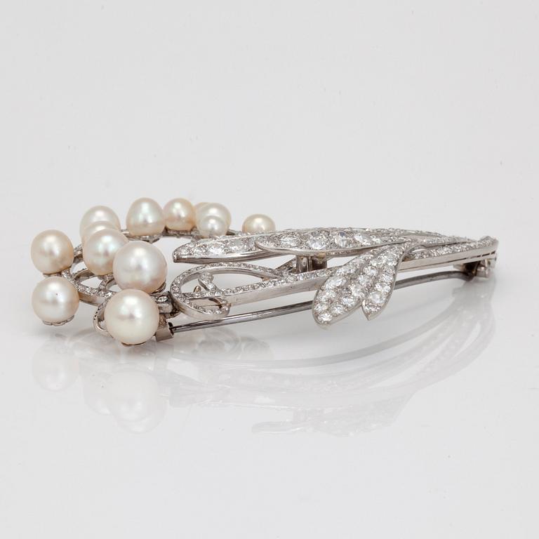 A tiara/brooch set with old cut diamonds and possibly cultured pearls, with noble provenance.