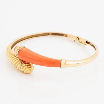 Gold and coral and diamond bangle.