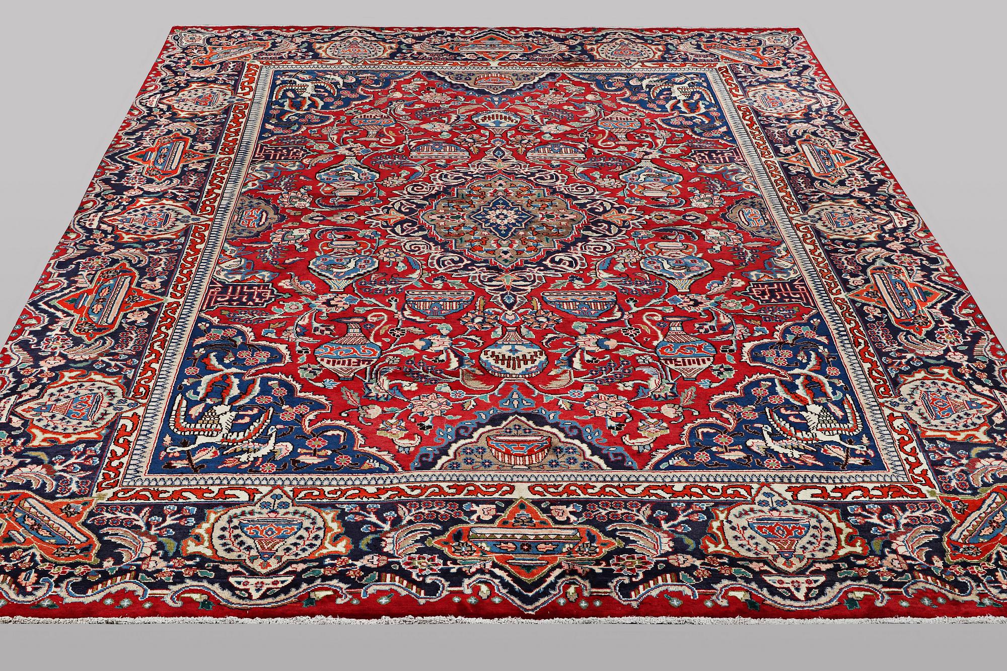 A carpet, Kashan, ca 388 x 290 cm.