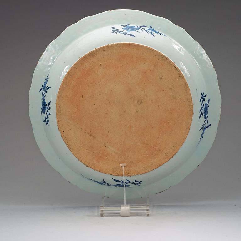 A pair of large blue and white serving dishes with strainers, Qing dynasty, Qianlong (1736-95).