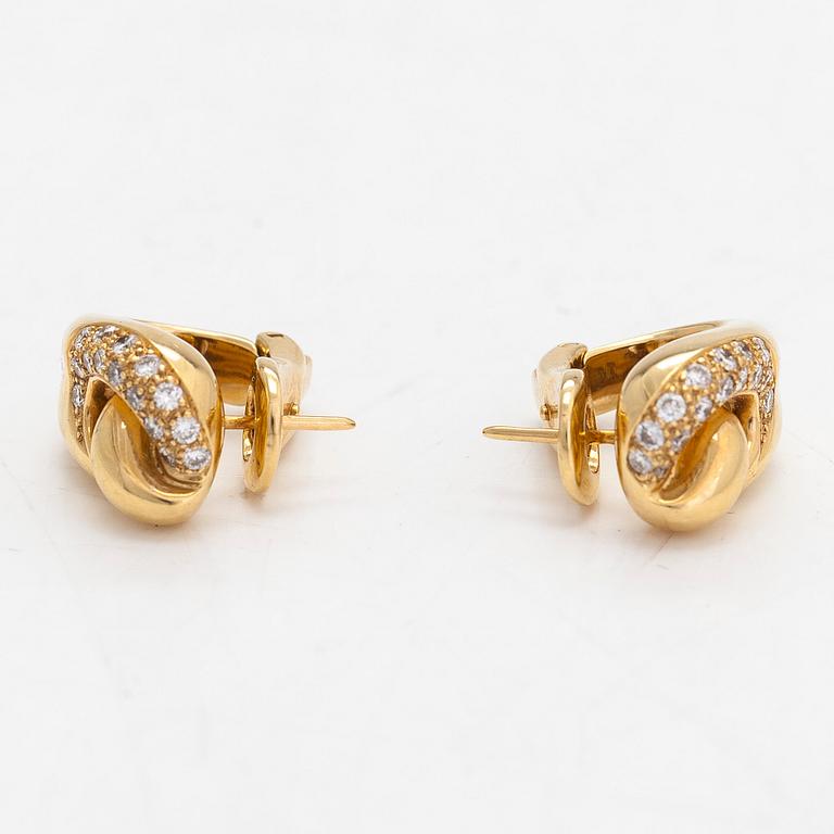 A pair of 18K gold earrings, diamonds totalling approximately 0.30 ct. Foreign hallmarks.