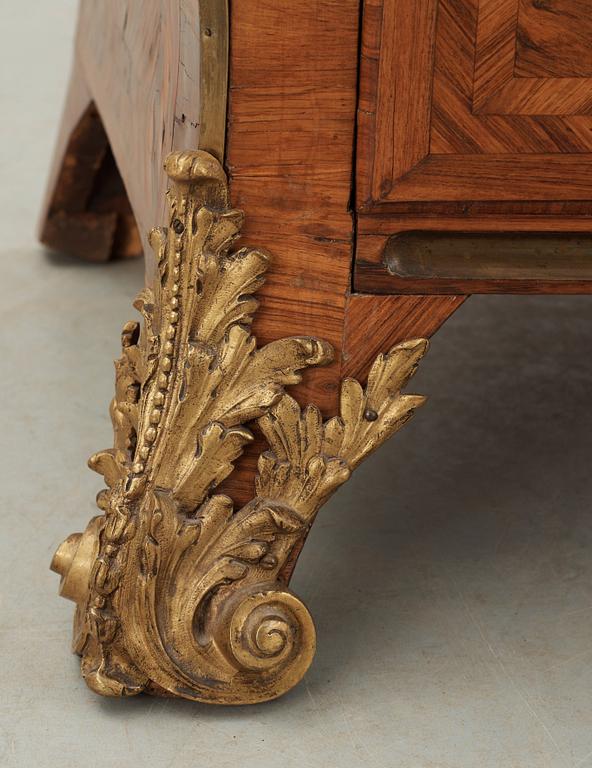A French Régence 18th century commode in the manner of F. Mondon.