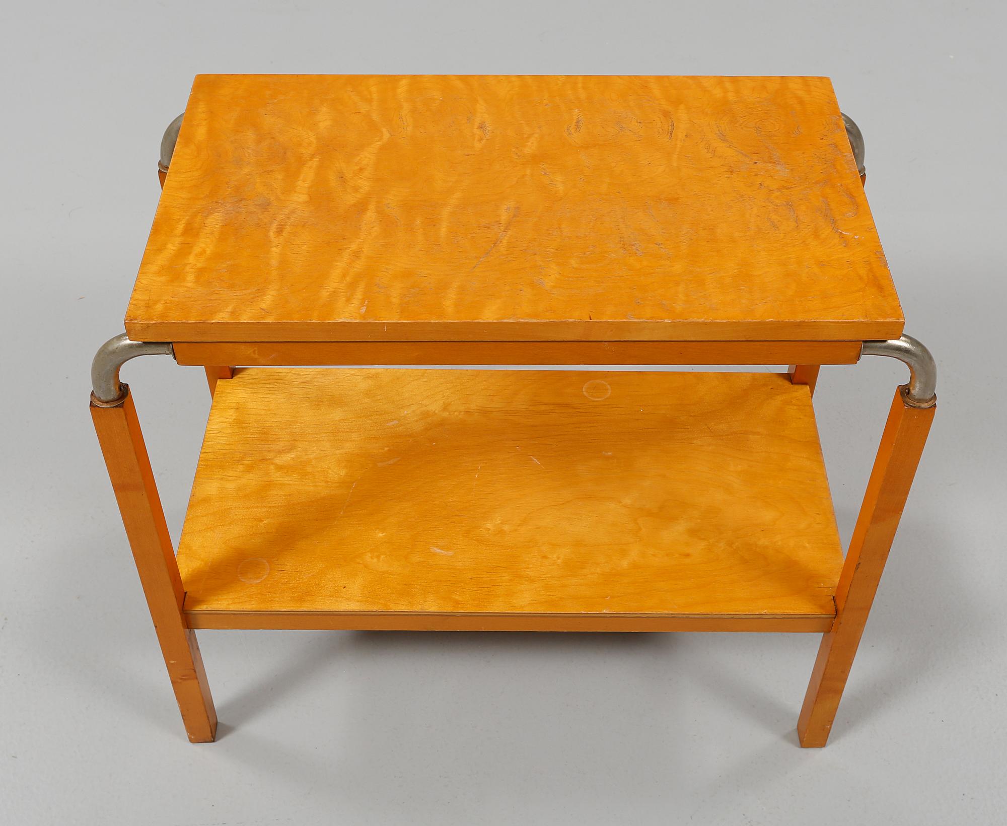 SIDOBORD, Ferdinand Lundqvist, 1900-talets första hälft.