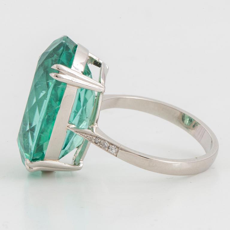 Large greenblue oval faceted tourmaline  cocktail ring.