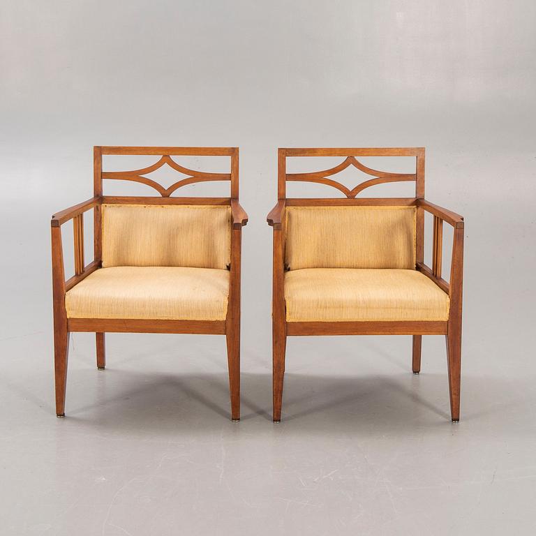A pair of armchairs around 1900.