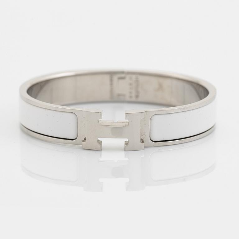 Hermès, bangle, "Clic H PM", silver coloured metal and white enamel.