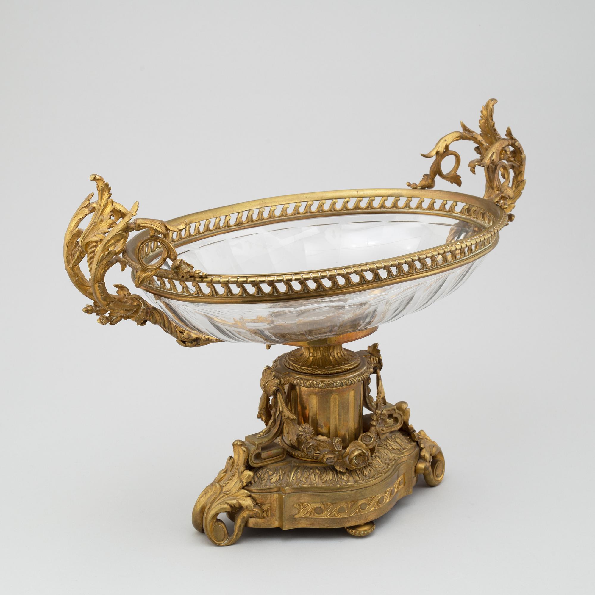 A LOUIS SEIZE STYLE  ORMOLU JARDINIERE, first half of the 19th century.