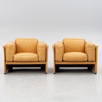 Mario Bellini, a pair of lounge chairs, Cassina, Italy.