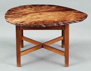 A Josef Frank agate top table on a mahogany base, by Svenskt Tenn.