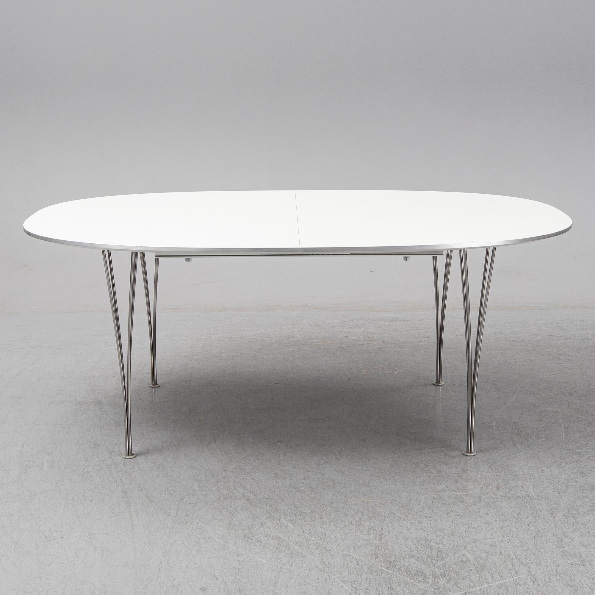 BRUNO MATHSSON & PIET HEIN, a 'Superellips' dining table, Fritz Hansen, Denmark.