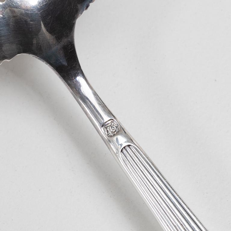 C.G. Hallberg, A Swedish silver sugar bowl with glass insert, mark of CG Hallberg, Stockholm 1896.