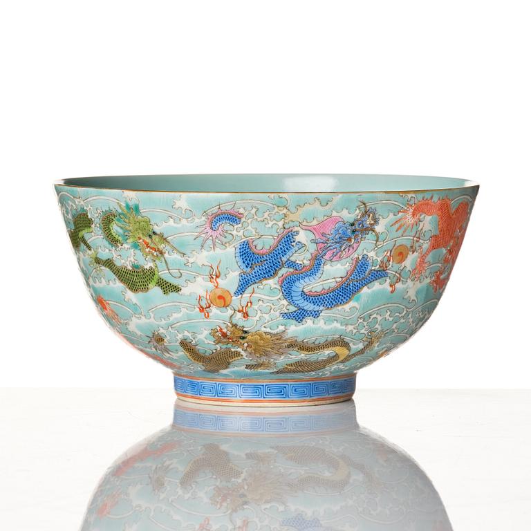 A Chinese nine dragon bowl, presumably Republic, 20th Century.