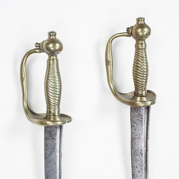 A pair of Swedish 18th Century cutlasses.