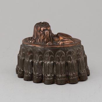 A 19th century pewter and copper mould.